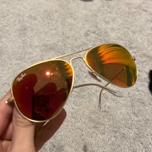 Orange Rayban sunglasses